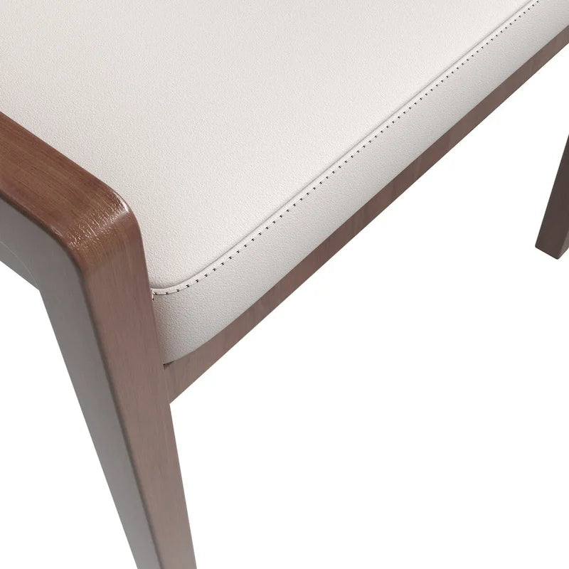 Sedia da pranzo in pelle con schienale aperto curvo e gambe in legno di gomma